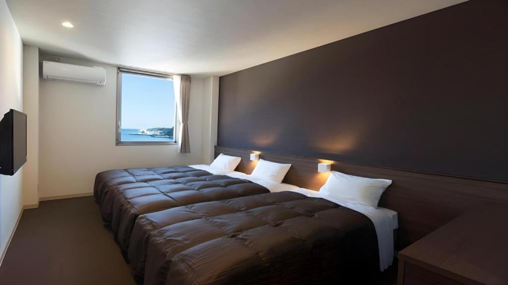 Daemado Hotel Hitakatsu Kamitsushima Bagian luar foto